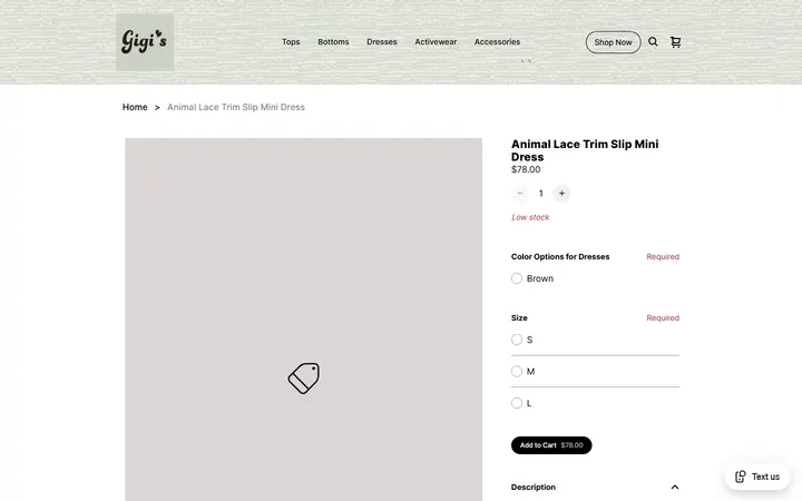 Website page titled Animal Lace Trim Slip Mini Dress | Gigi's Boutique