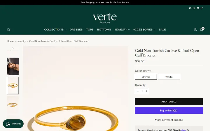 Website page titled Gold Non-Tarnish Cat Eye & Pearl Open Cuff Bracelet – Verte Boutique