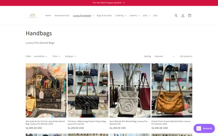 Website page titled Handbags – L' Atelier Luxury Boutique