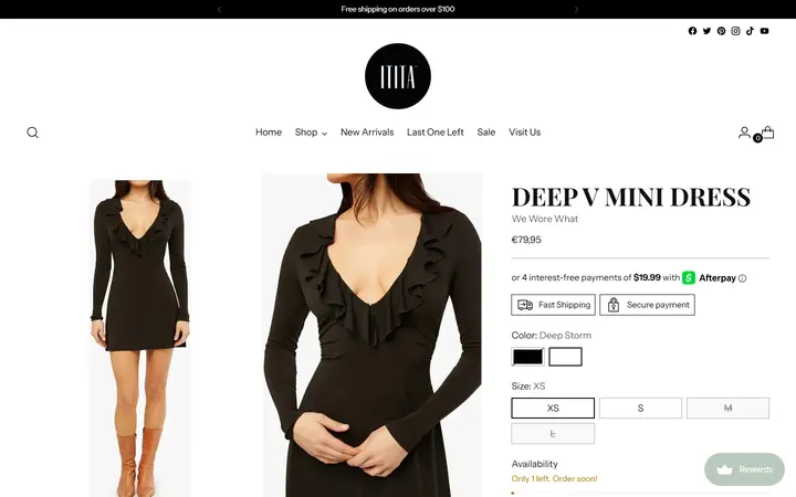 Website page titled Deep V Mini Dress – ititaboutique