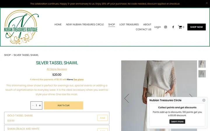 Website page titled SILVER TASSEL SHAWL — Nubian Treasures Boutique